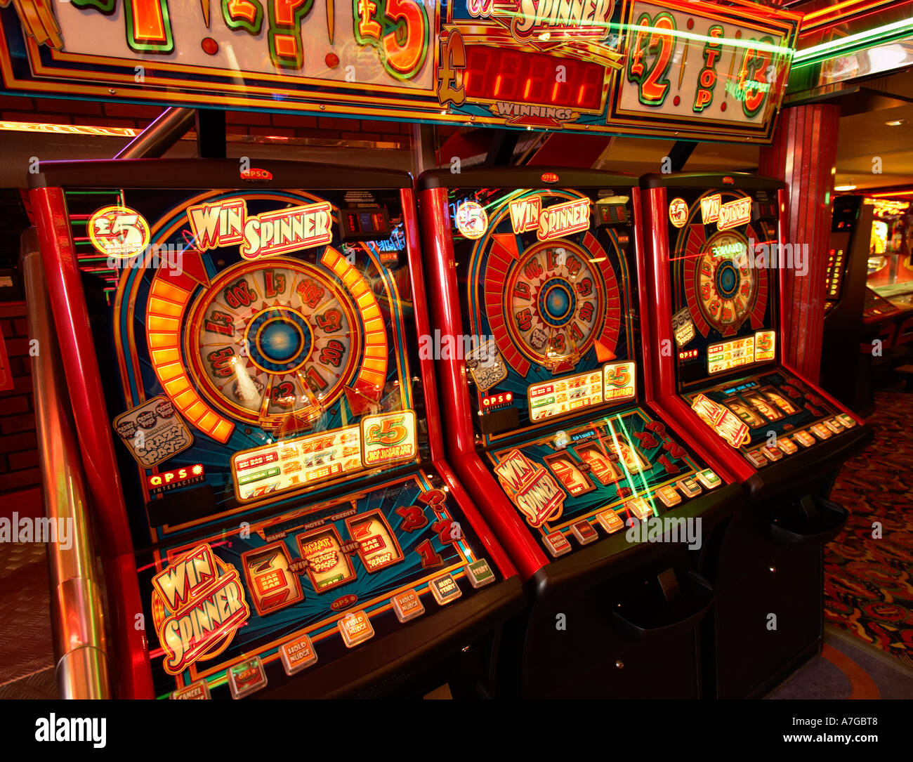 Fruit machines in amusement arcade at the seaside, UK Stock Photo