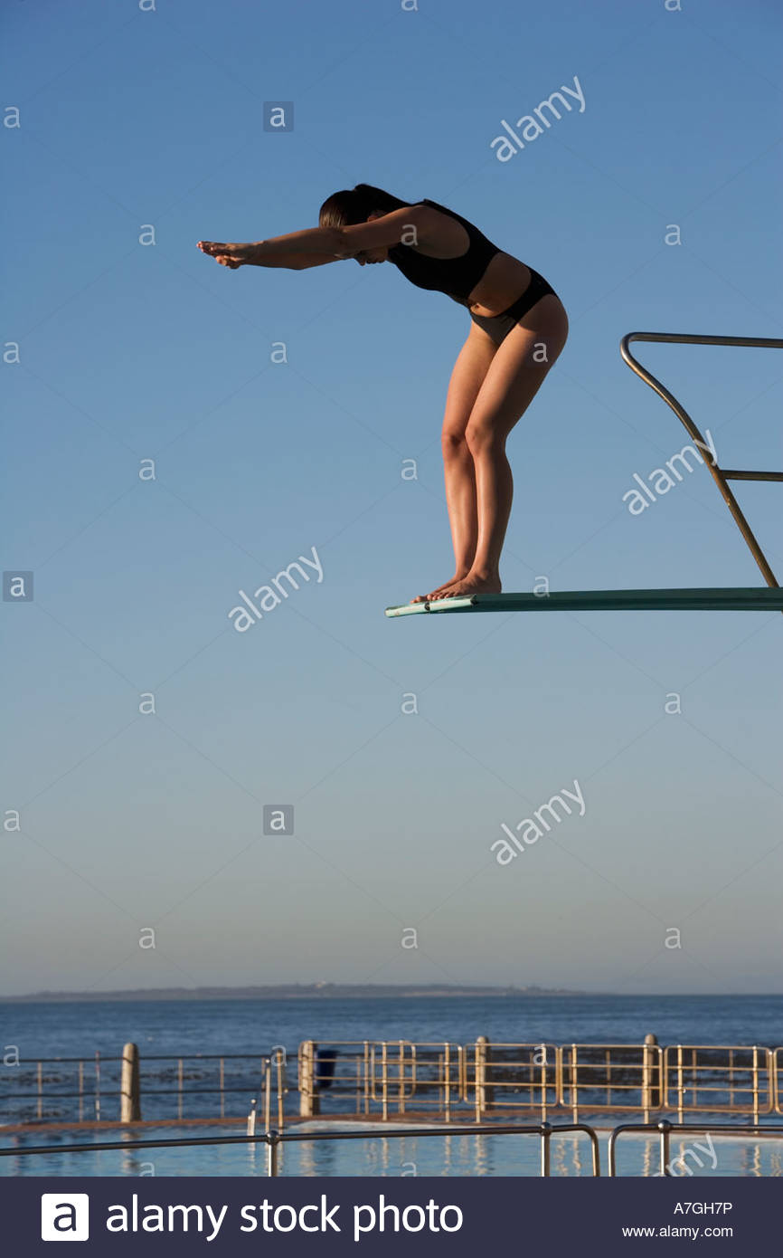 Person Diving Into Swimming Pool Stock Photos & Person Diving Into ...