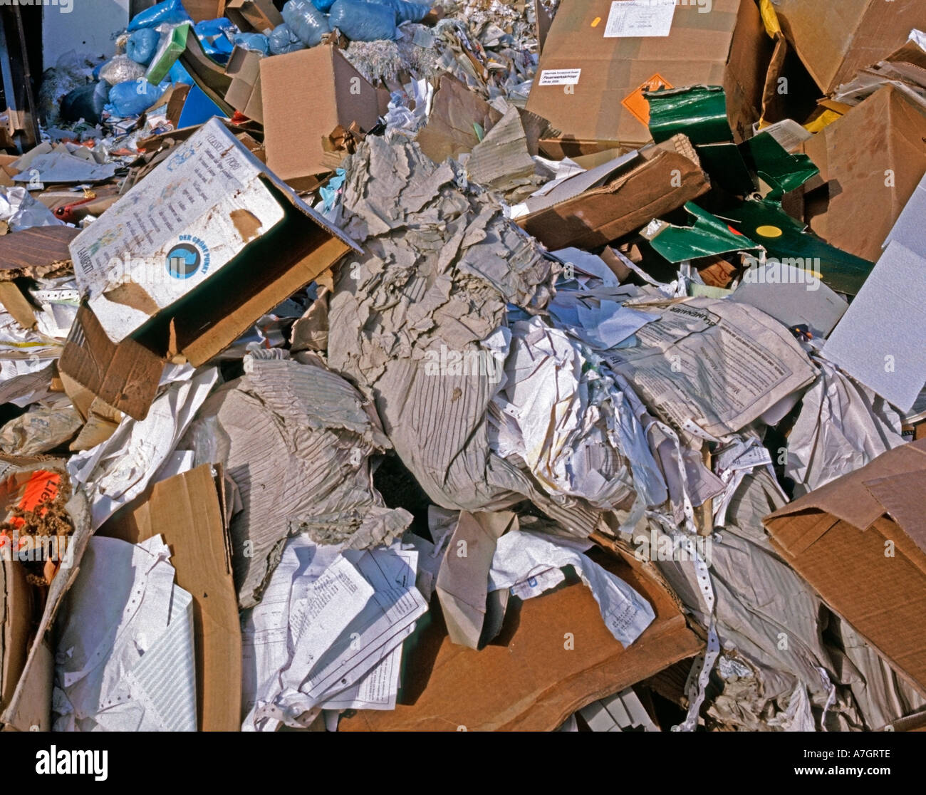 litter trash with paper and cardboard Stock Photo Alamy