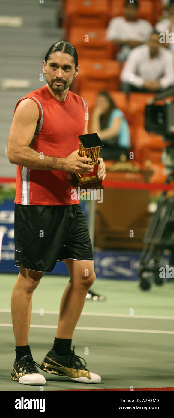 Chilean tennis star Marcelo Rios after winning his comeback tournament in  Doha Qatar with the winner s trophy Stock Photo - Alamy