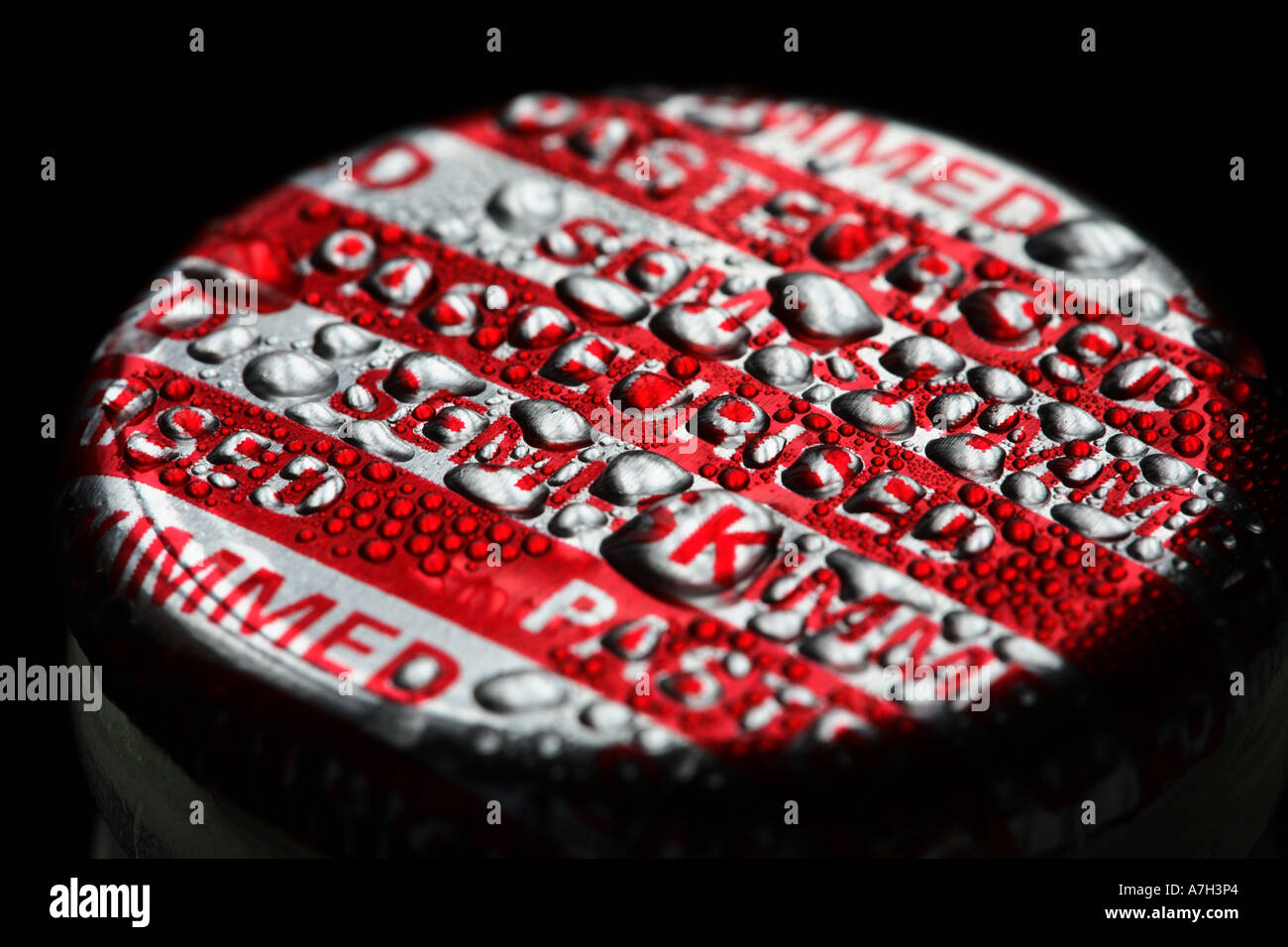 Milk Bottle Top semi skimmed milk bottle top covered in raindrops