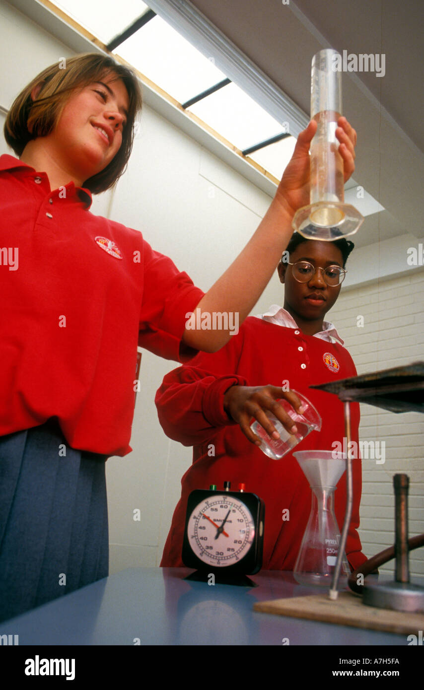 Science class at girls secondary school Stock Photo Alamy