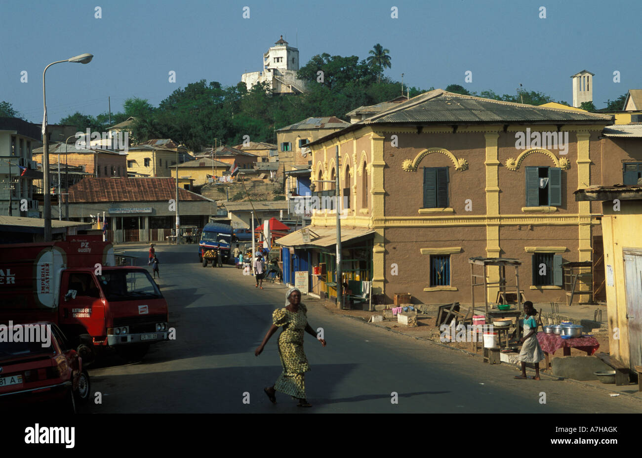 street scene in Cape Coast with Fort William on the hill, once a