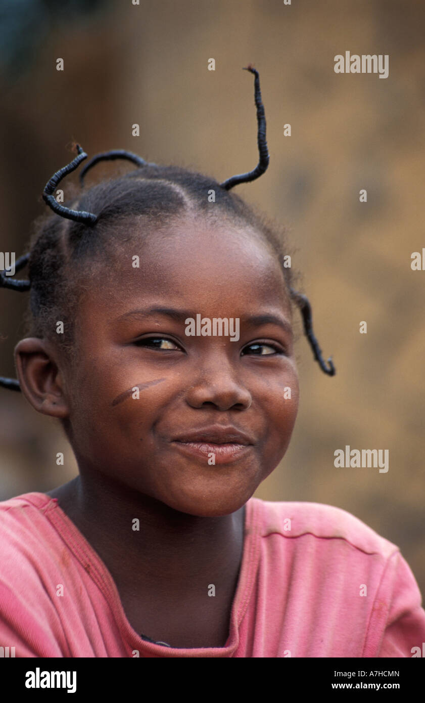 Girl with traditional hairstyle and tibal scarring, Sirigu, Upper East region, Ghana Stock Photo