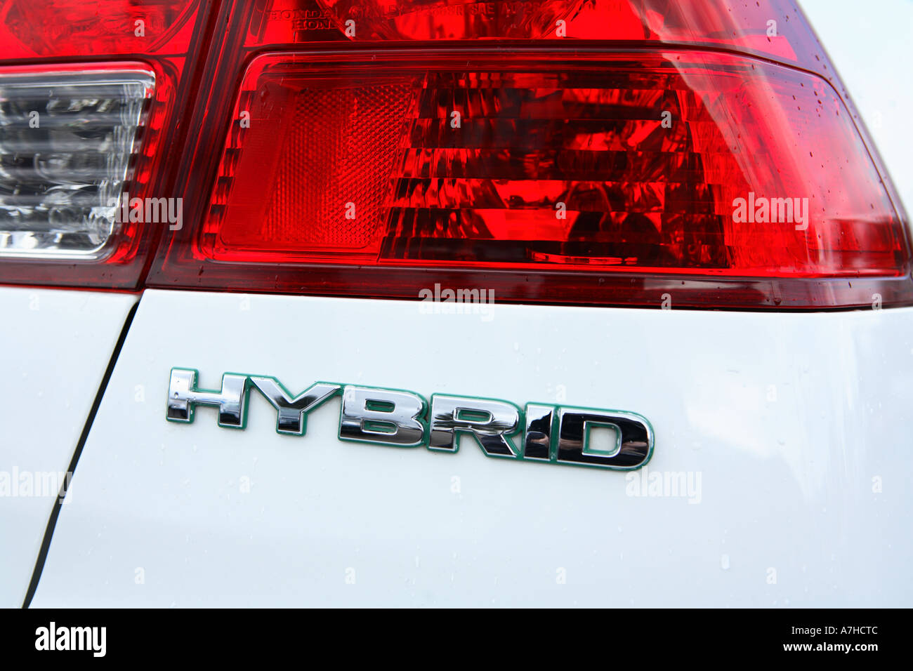 Rear logo on a Honda Civic Hybrid car. Stock Photo