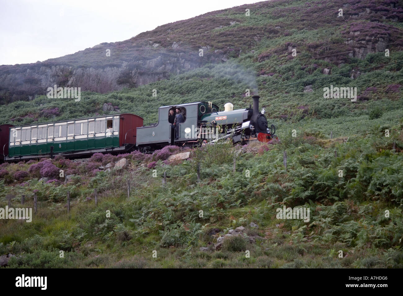 Steam train on the Ffestiniog railway above Tanygrisiau reservoir