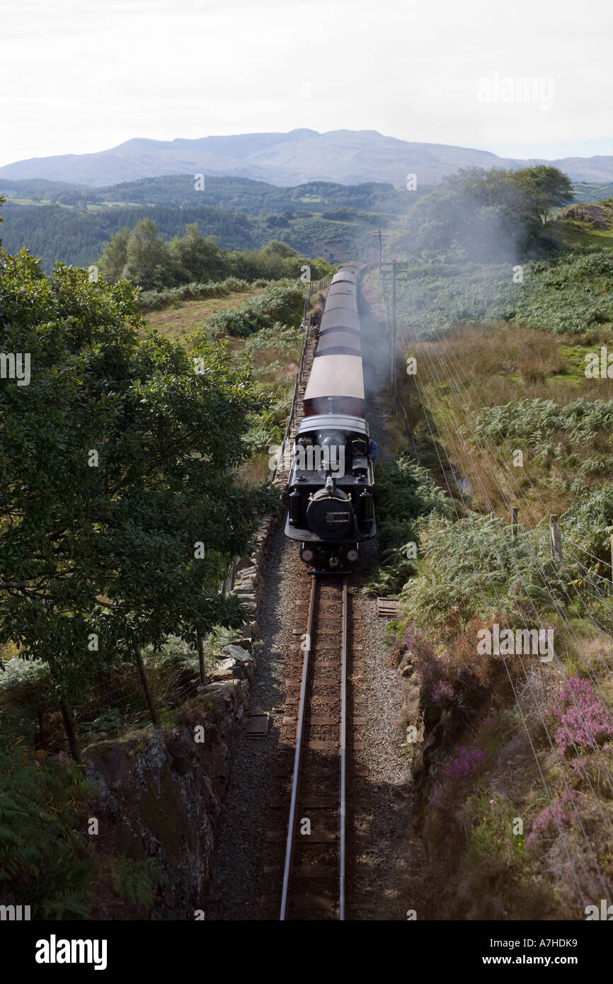 Steam train on the Ffestiniog railway in the hills between Porthmadog