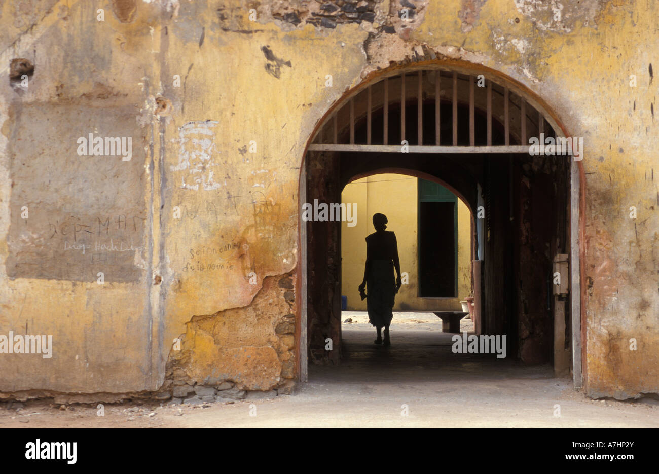 crumbling old colonial building on the market square Goree Island Senegal Stock Photo