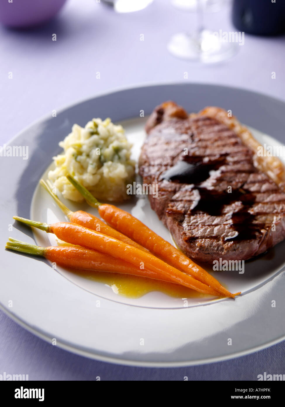 Colcannon Carrots Glazed carrots rump steak colcannon Stock Photo - Alamy