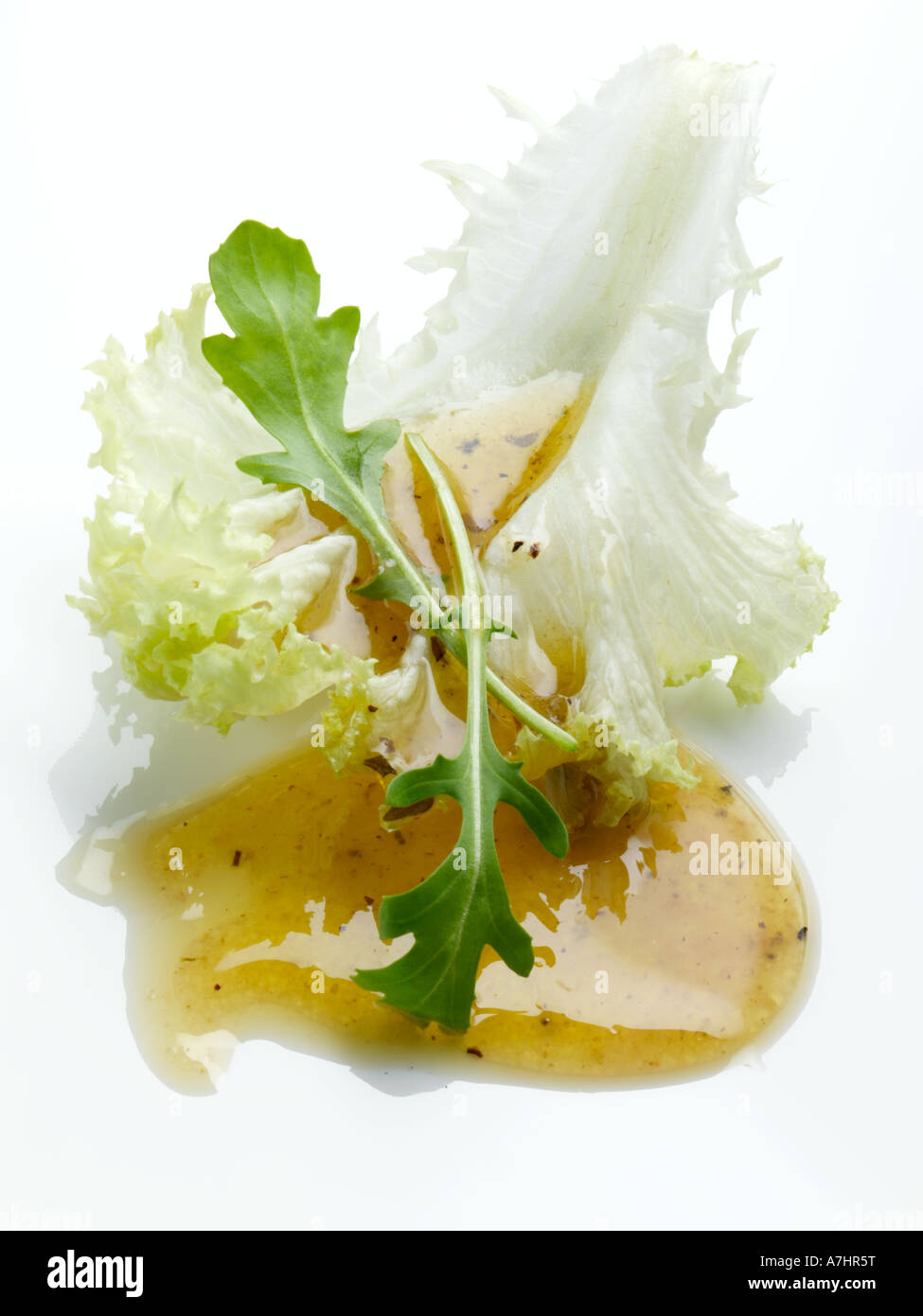 Lettuce leaf rocket and salad dressing editorial food Stock Photo Alamy