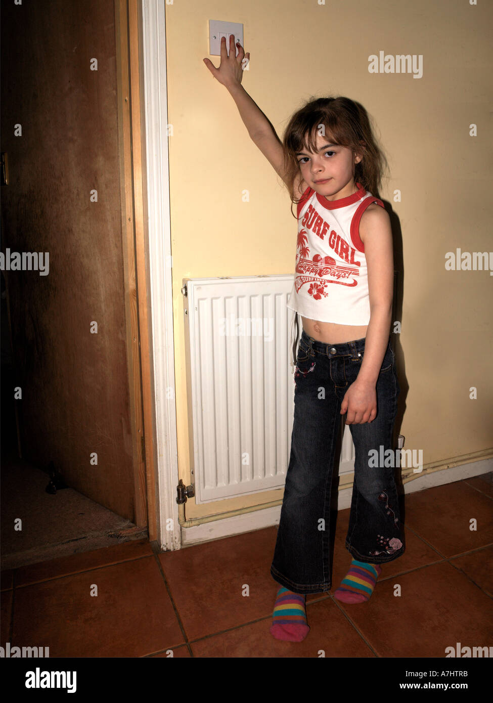 Child turning off light hi-res stock photography and images - Alamy