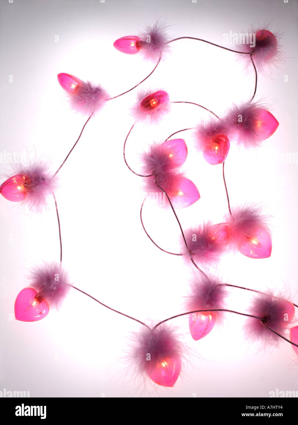 String of Coloured Lights Pink Hearts with Pink Fluff Stock Photo - Alamy