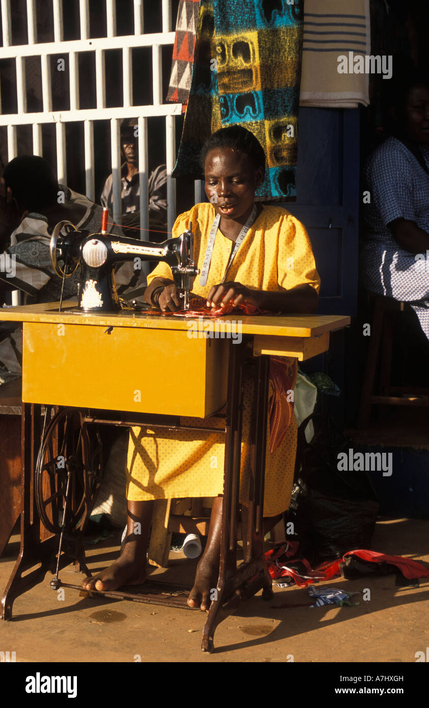 woman sowing clothes in the market Jinja Uganda Stock Photo Alamy