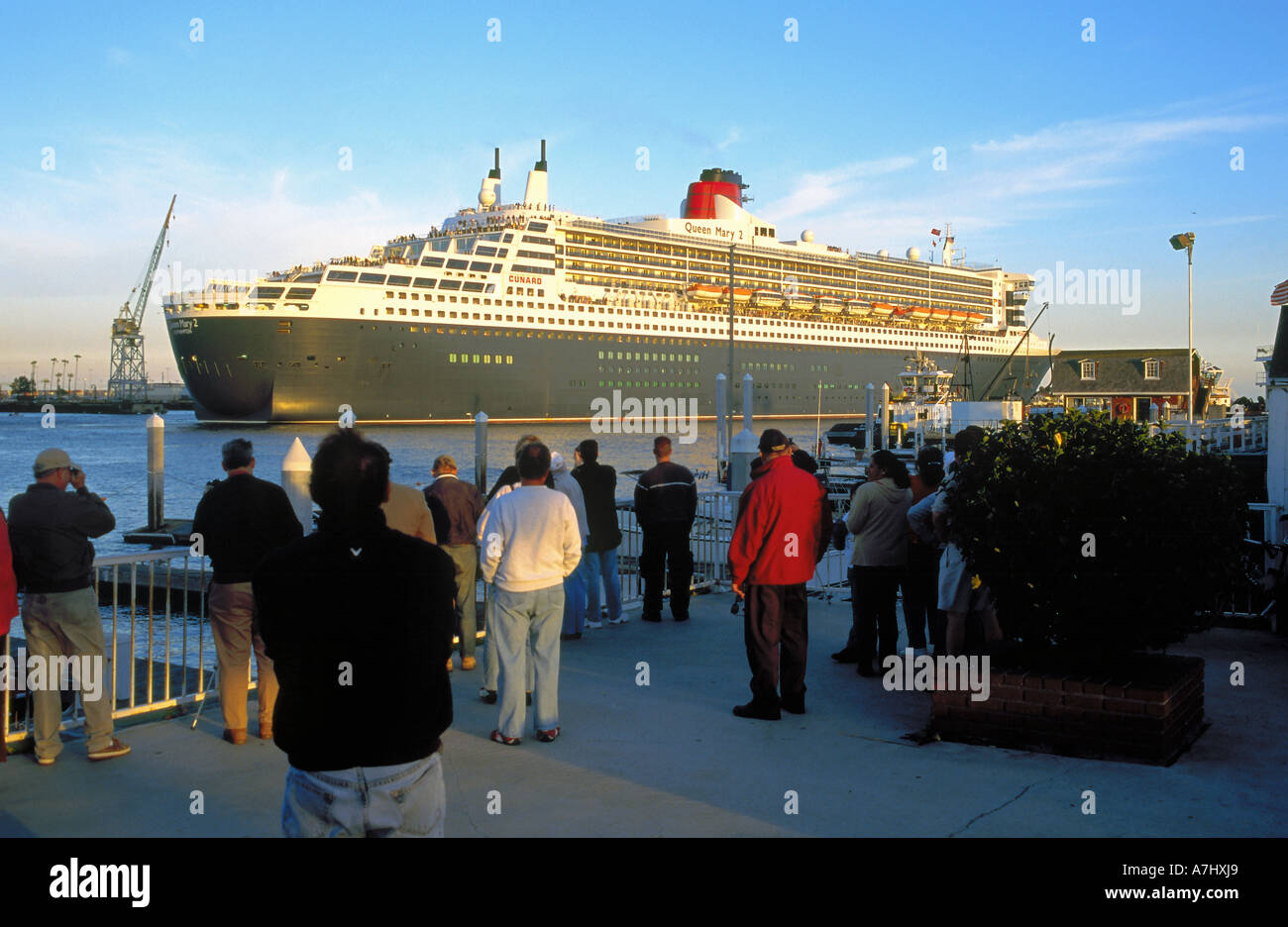The Queen Mary 2 as she slowly passes through the Main Channel in San Pedro harbor, Los Angeles, California, Stock Photo