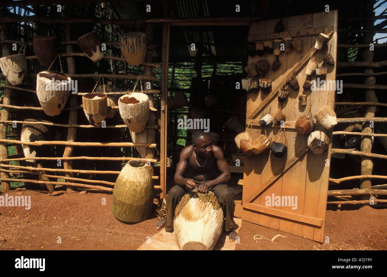 Drum maker in Mpambire village the home of Royal drum makers Uganda
