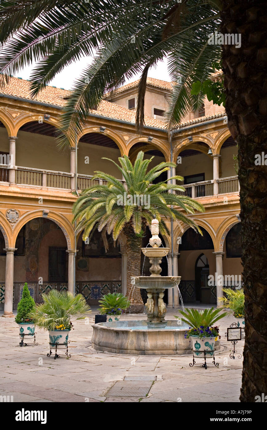 Courtyard and fountain in the hospital of San Juan de Dios Granada Spain Stock Photo