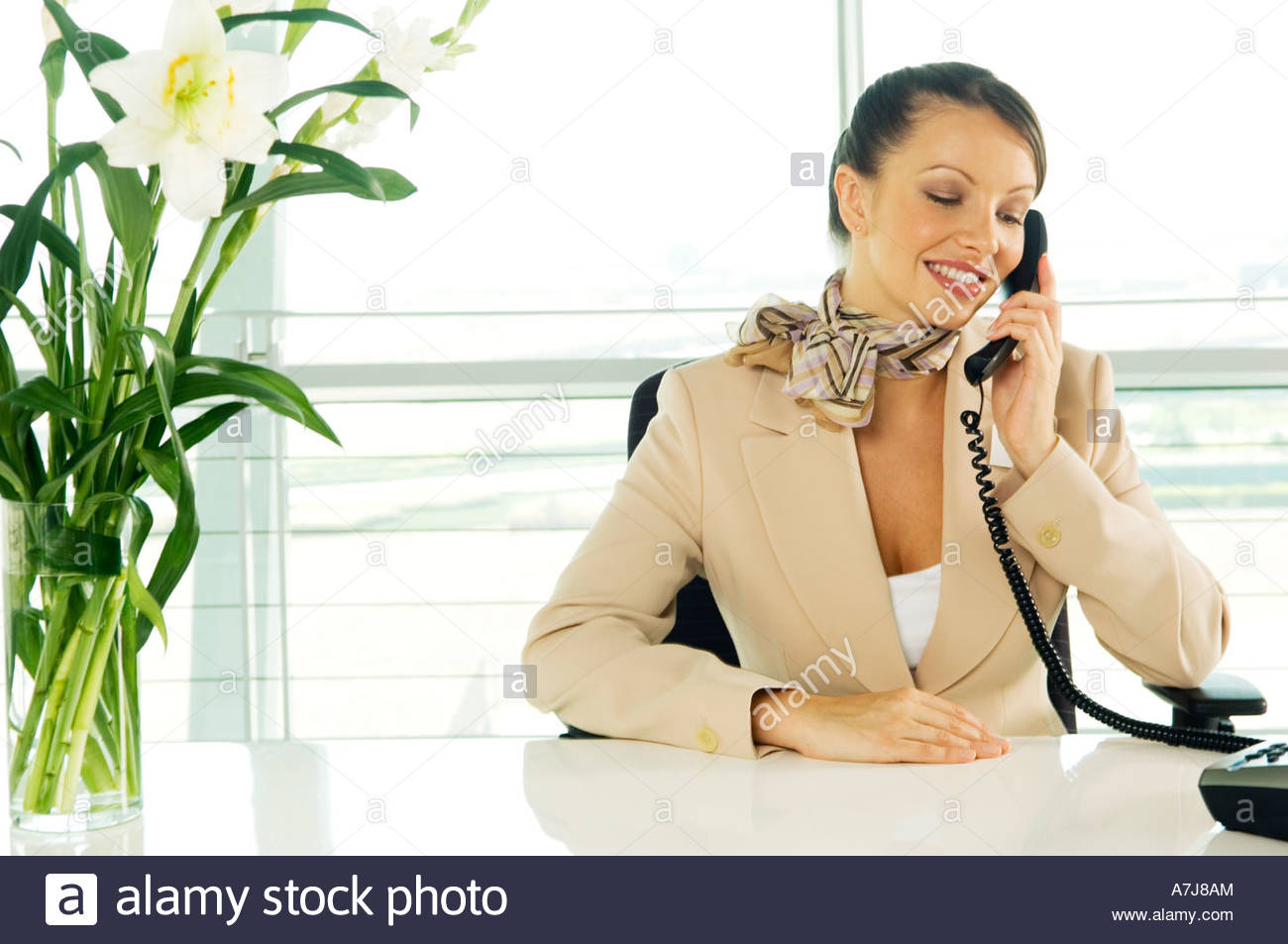 Receptionist Answering Phone Stock Photos & Receptionist Answering Phone Stock Images Alamy