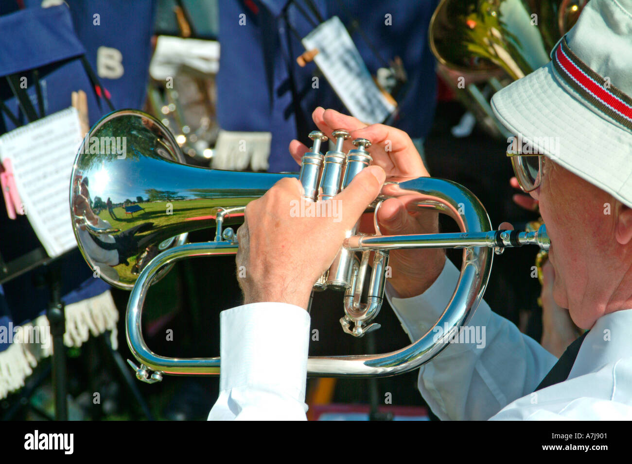 A flugelhorn player of the Highworth Siver Band at Longworth Stock