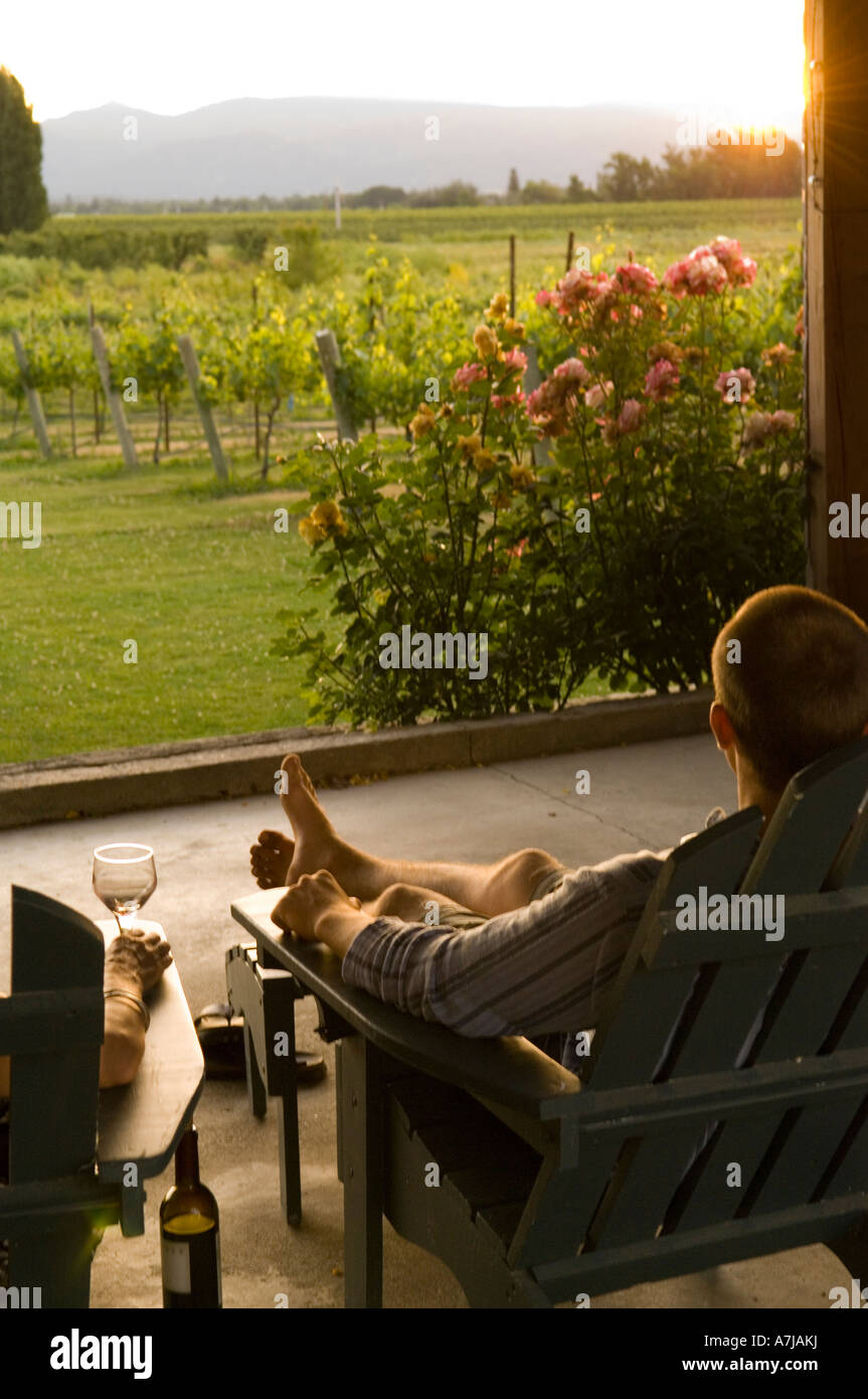 Couple enjoys vineyard view at Rogue Valley Wine Center near Ashland Oregon Stock Photo