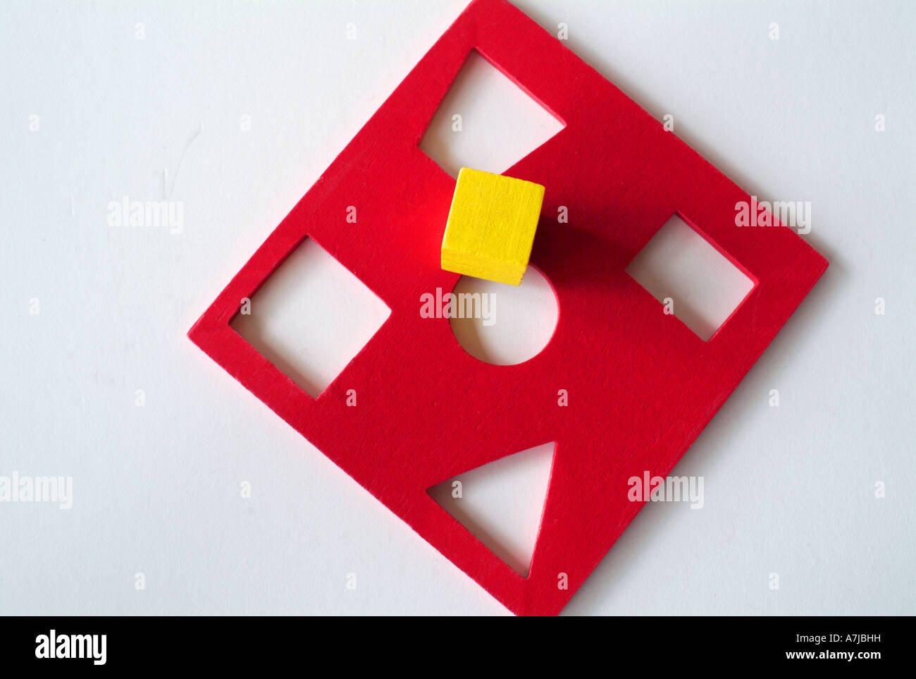 Square Peg In A Round Hole Stock Photo