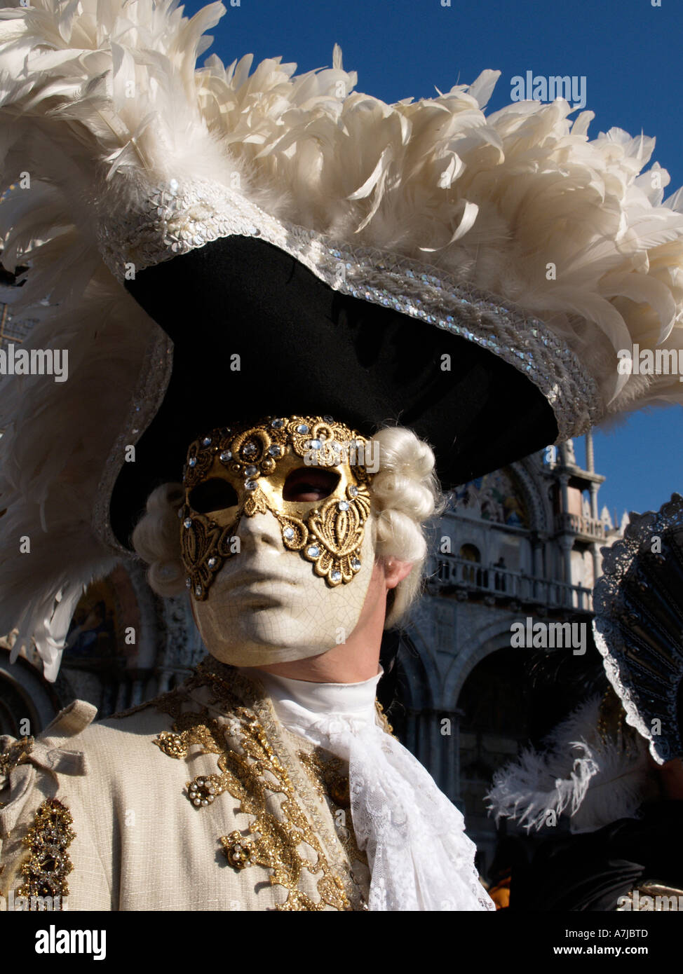 man in 18th century costume with feathered tricorn hat Venice Stock