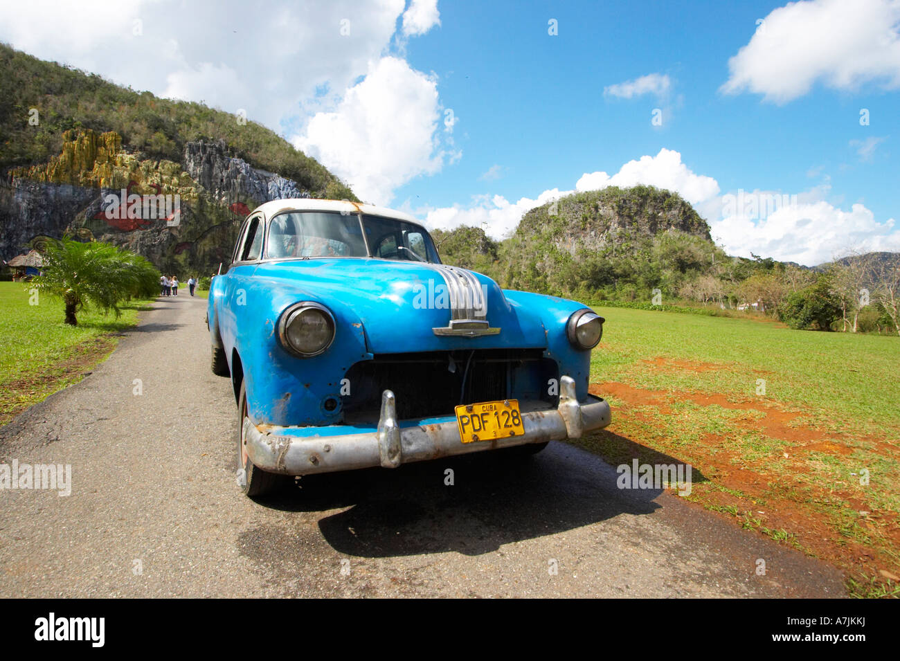 Cuban car in front of Mural de la Prehistoria Vinales Cuba Stock Photo