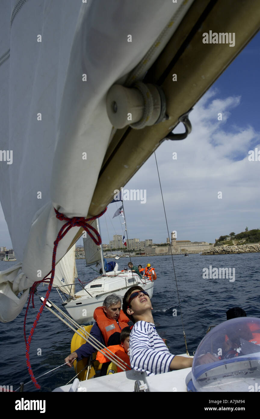 People sailing in the harbour of Marseille, France. Stock Photo