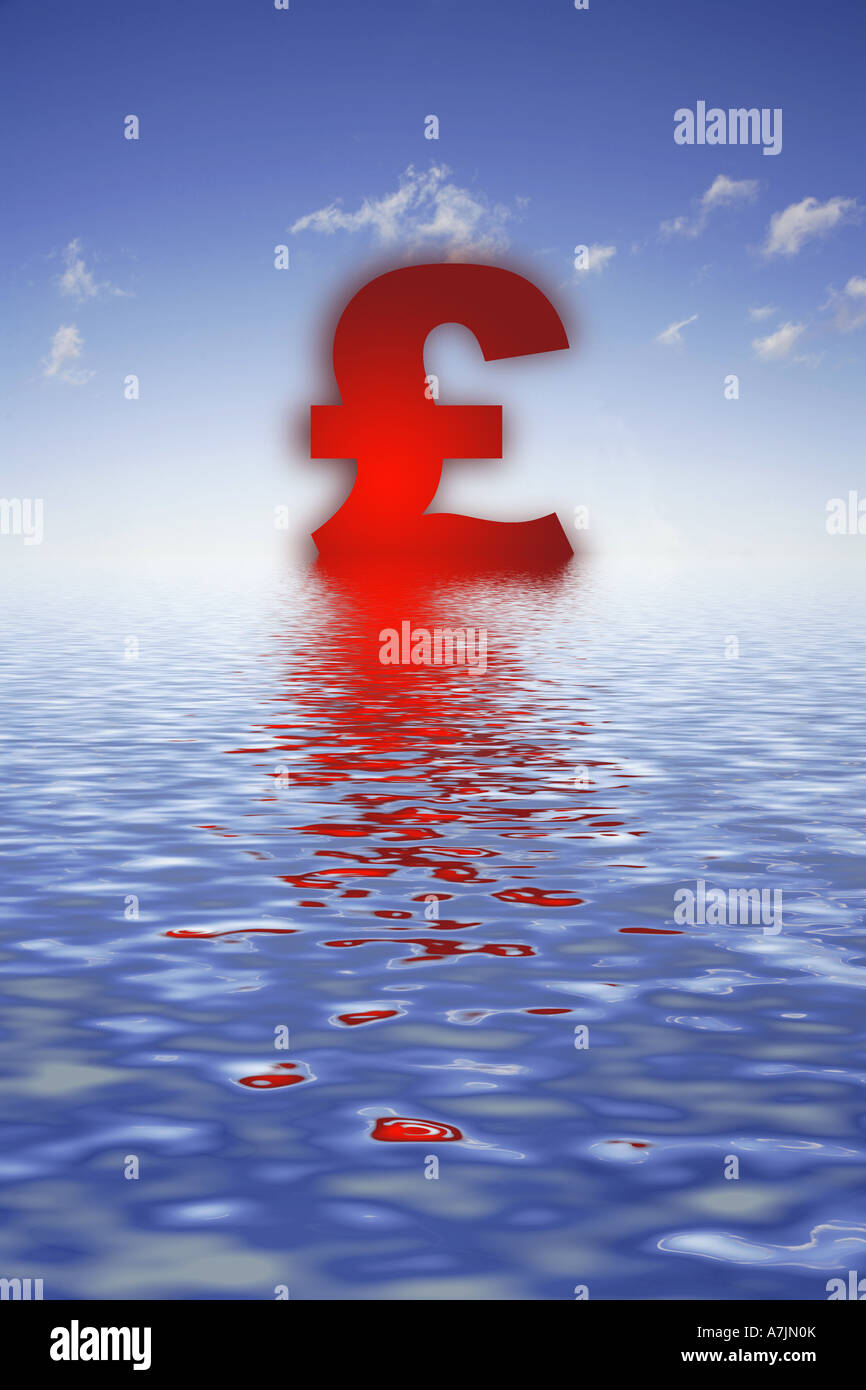 Pound Sterling sign sinking into ocean Stock Photo