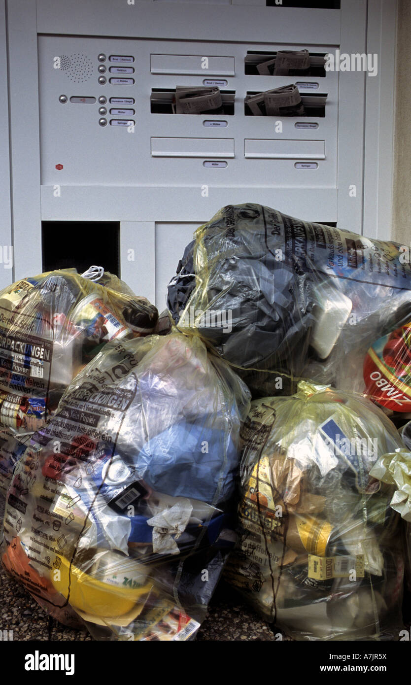 Domestic waste for recycling waiting collection outside apartments in
