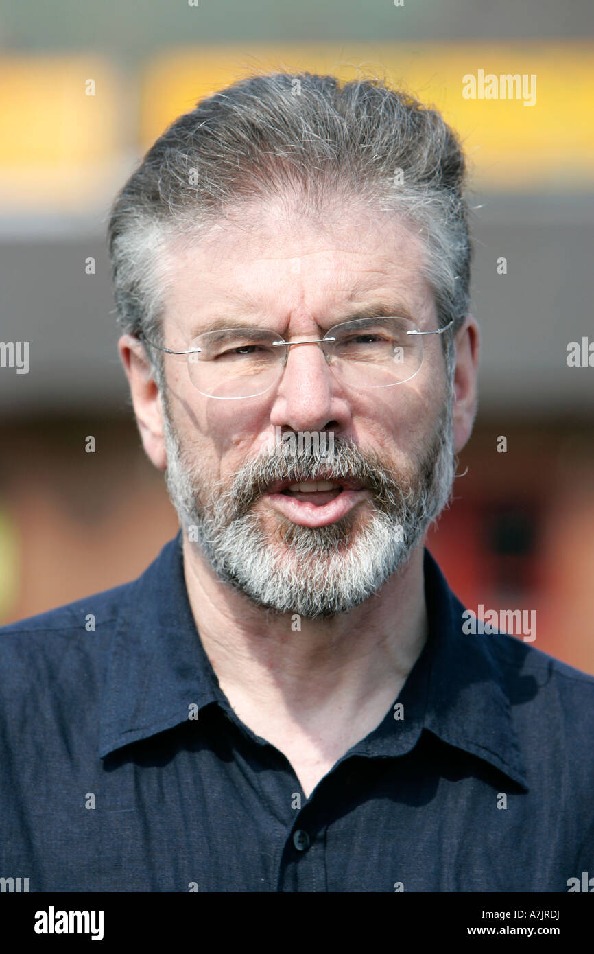 head and shoulders of Gerry Adams speaking at a street press conference in West Belfast Stock Photo
