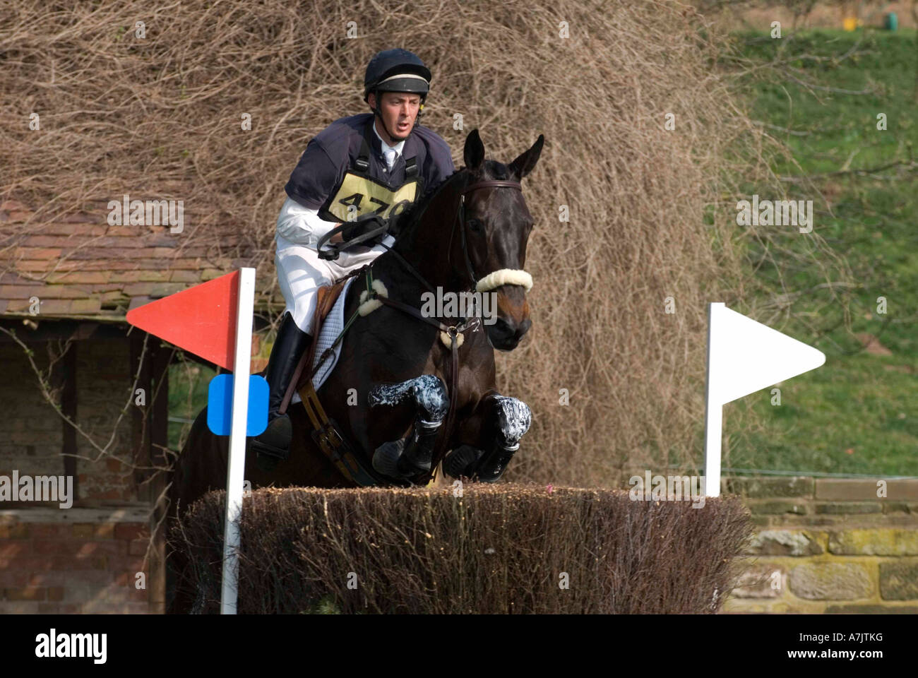 Three Day Event Rider Taking part in the Cross Country Phase at the Weston Park Spring Horse Trial 2007 Stock Photo