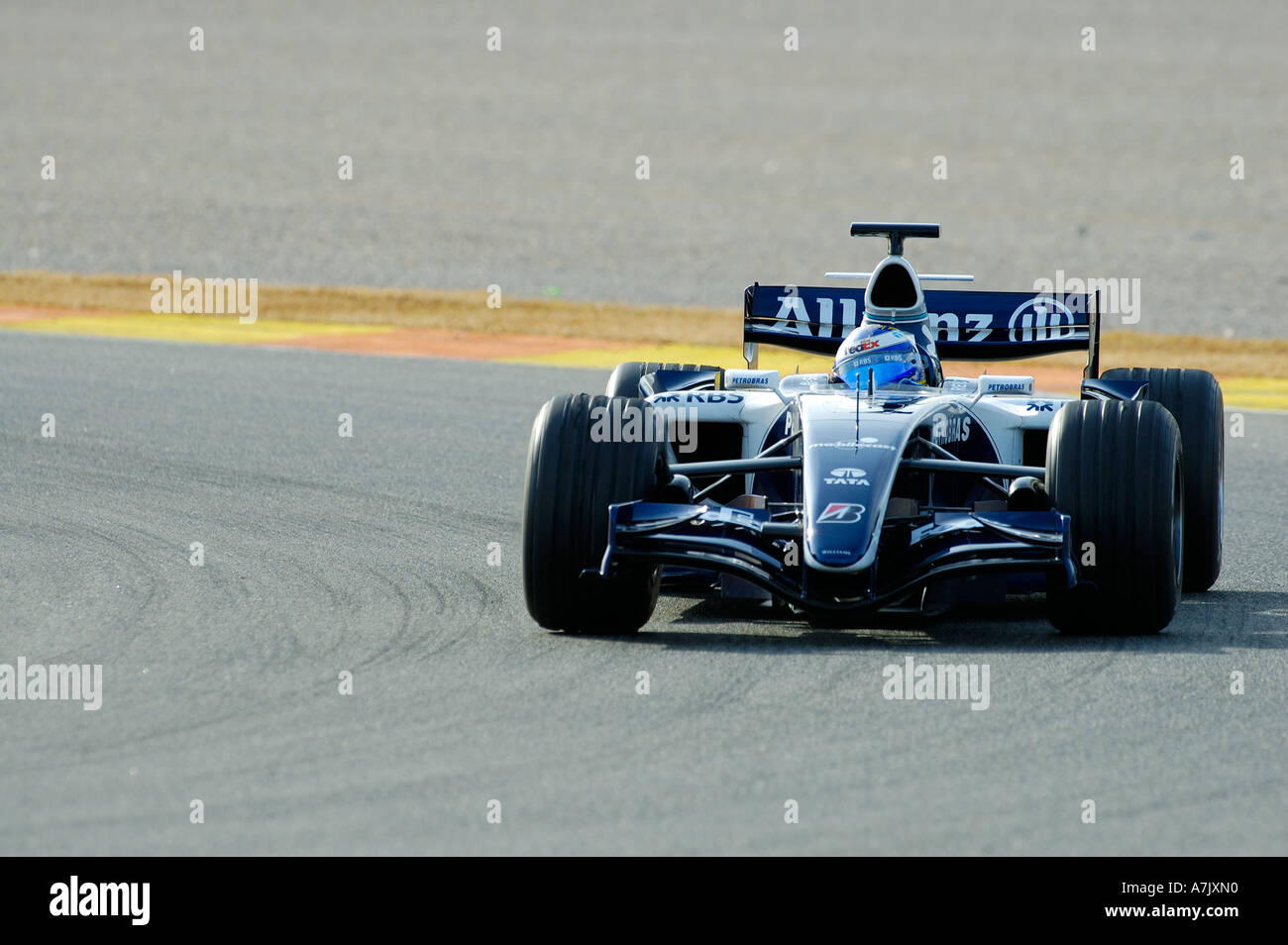Nico Rosberg races his Williams Formula One racecar around the track at ...