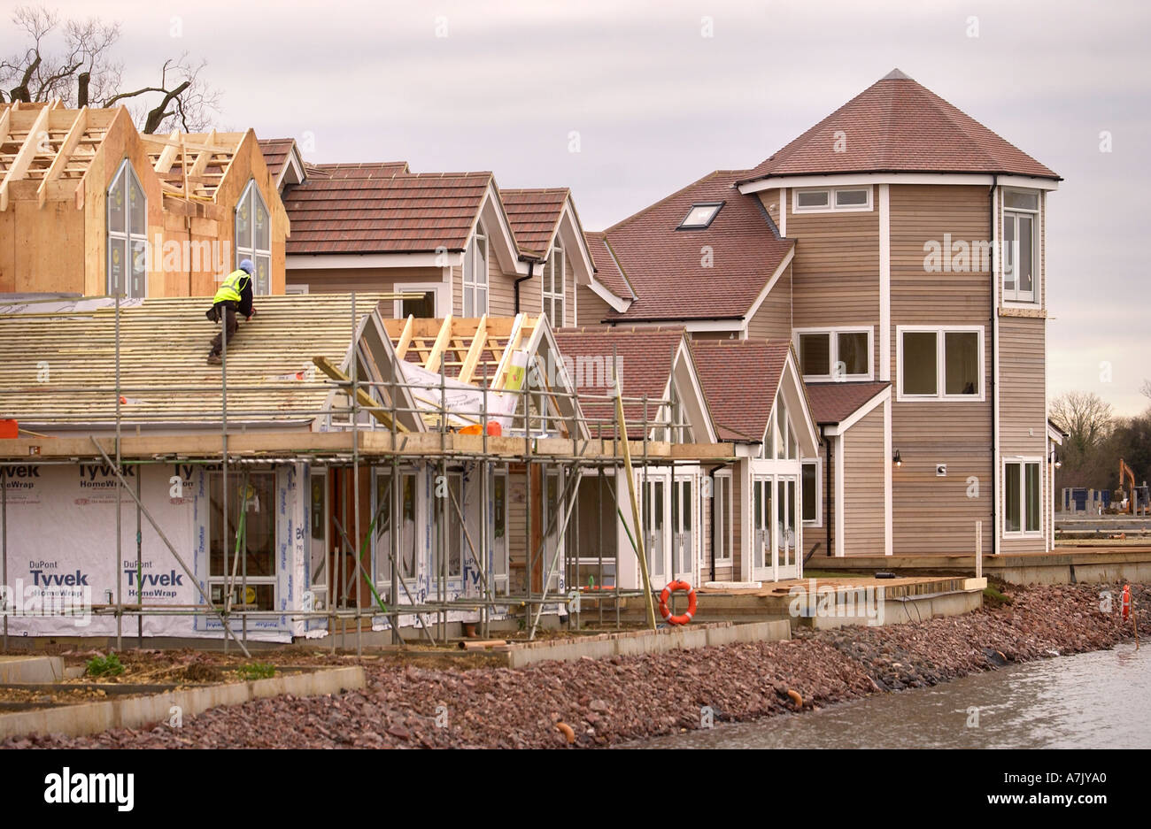 CONSTRUCTION OF NEW ENGLAND STYLE KIT HOUSES AT WINDRUSH LAKE THE