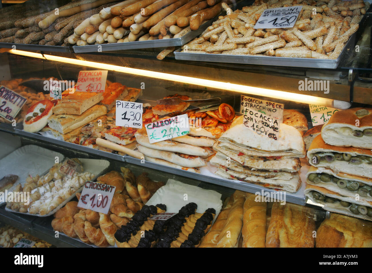 Typical Italian bakery window display with deliciuos local savoury