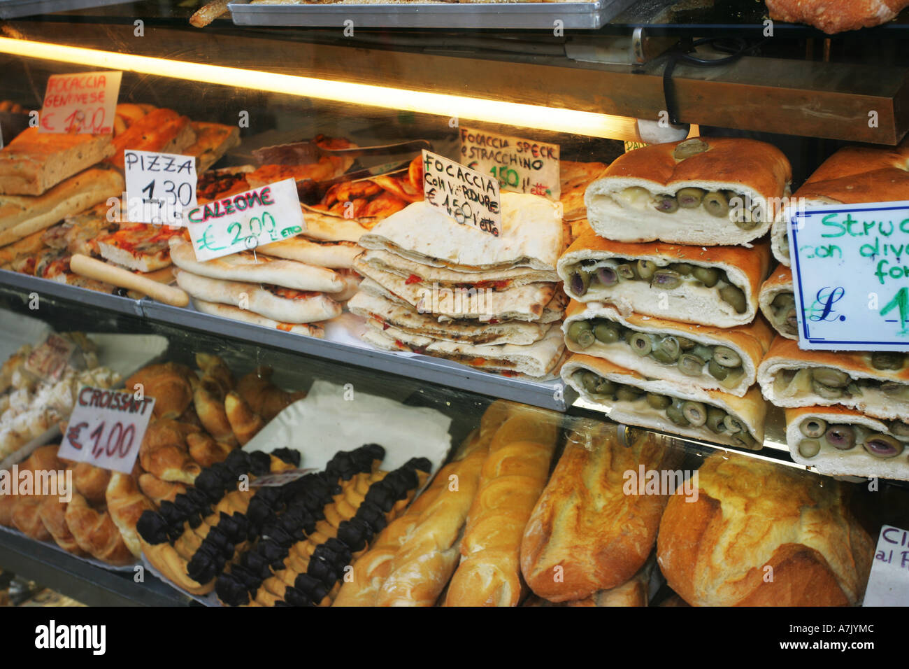 Typical Italian bakery window display with deliciuos local savoury