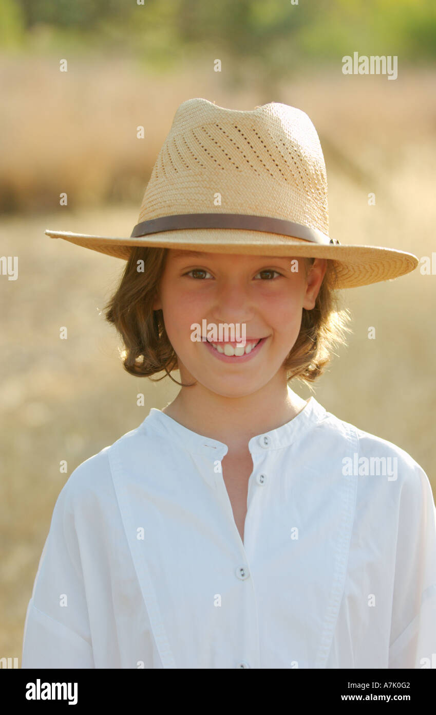 Romantic girl playing straw hat hi-res stock photography and images - Alamy