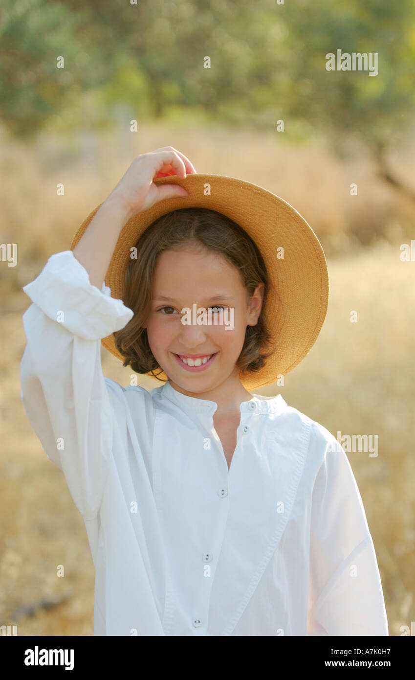 Romantic girl playing straw hat hi-res stock photography and images - Alamy