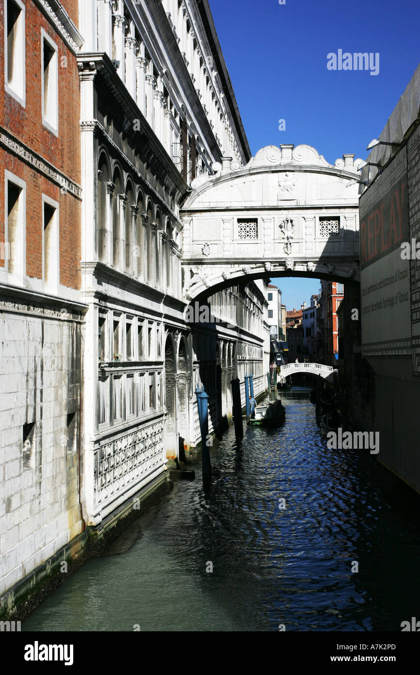 World famous architecture of the Bridge of Sighs Ponte dei Sospiri spanning a tyical Venice waterway near Grand Canal Italy EU Stock Photo