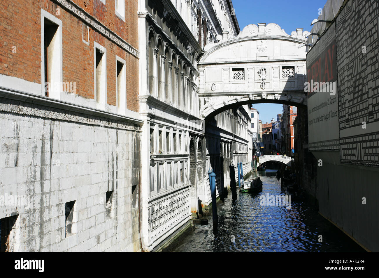 World famous architecture of the Bridge of Sighs Ponte dei Sospiri spanning a tyical Venice waterway near Grand Canal Italy EU Stock Photo