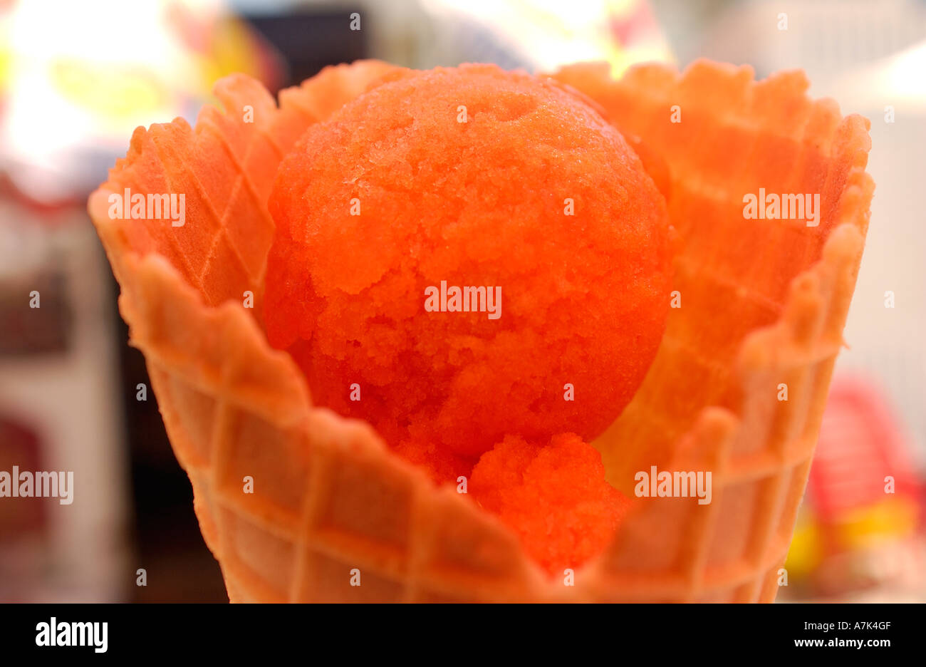 Orange flavoured ice cream cone Stock Photo Alamy