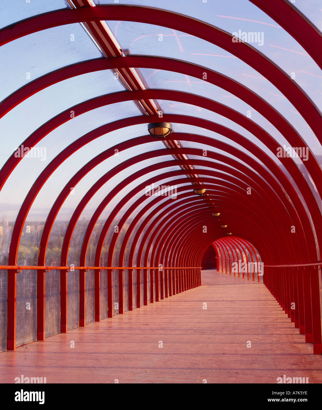 Covered walkway bridging the Clydeside Expressway, Glasgow, Scotland, UK Stock Photo