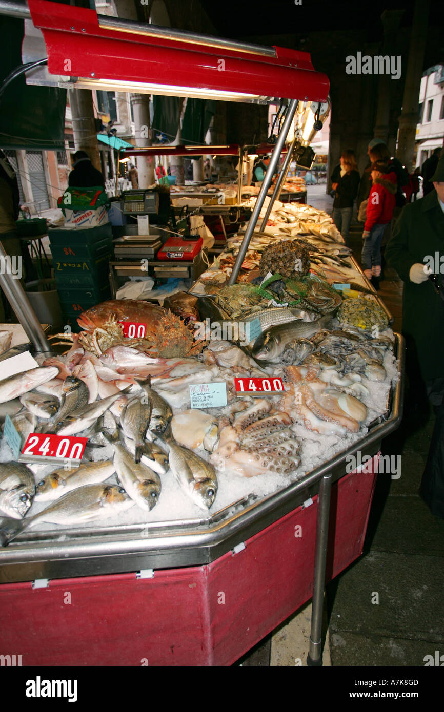 Famous Venice fish Market Prescaria near Rialto bridge and Grand Canal sells fresh local fish Italy Europe EU Stock Photo