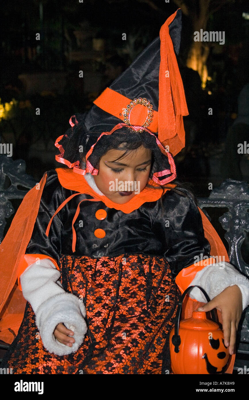 MEXICAN child trick or treating in the JARDIN during the DEAD OF THE DEAD SAN MIGUEL DE ALLENDE MEXICO Stock Photo