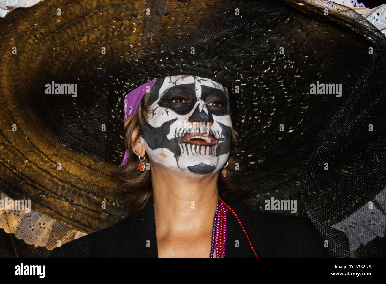 Adults dress up as skeletons during the DEAD OF THE DEAD SAN MIGUEL DE ALLENDE MEXICO Stock Photo