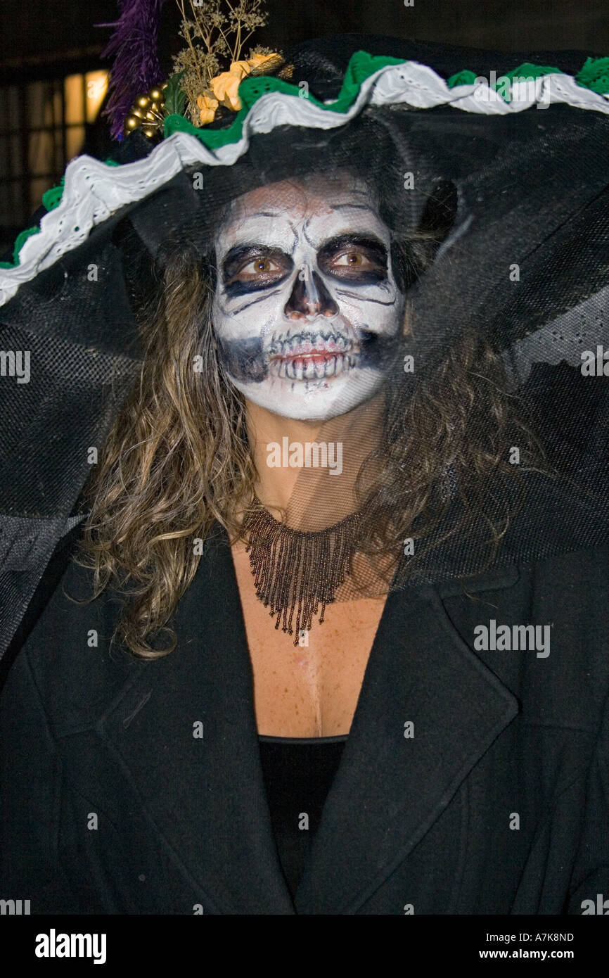 Adults dress up as skeletons during the DEAD OF THE DEAD SAN MIGUEL DE ALLENDE MEXICO Stock Photo