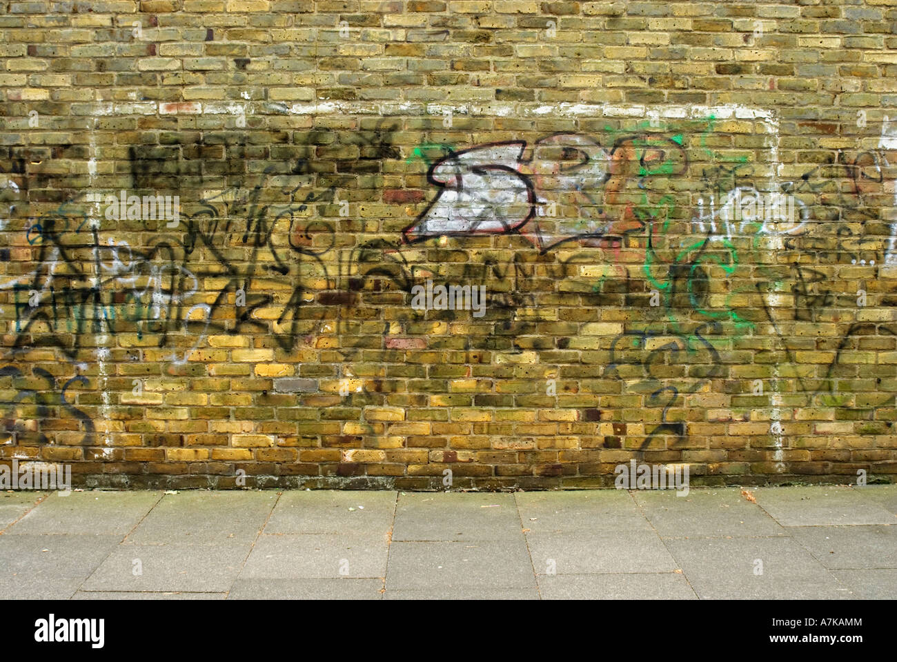 Goalposts painted onto a brick wall, with accompanying graffiti.  Harlow Town, UK Stock Photo