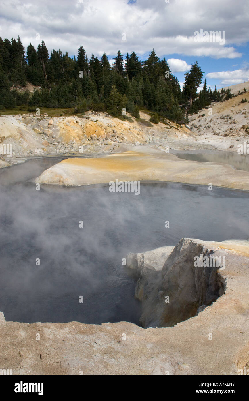 Geothermal activity creates steam at the hot sulfur pools of BUMPASS HELL in LASSEN NATIONAL PARK CALIFORNIA Stock Photo