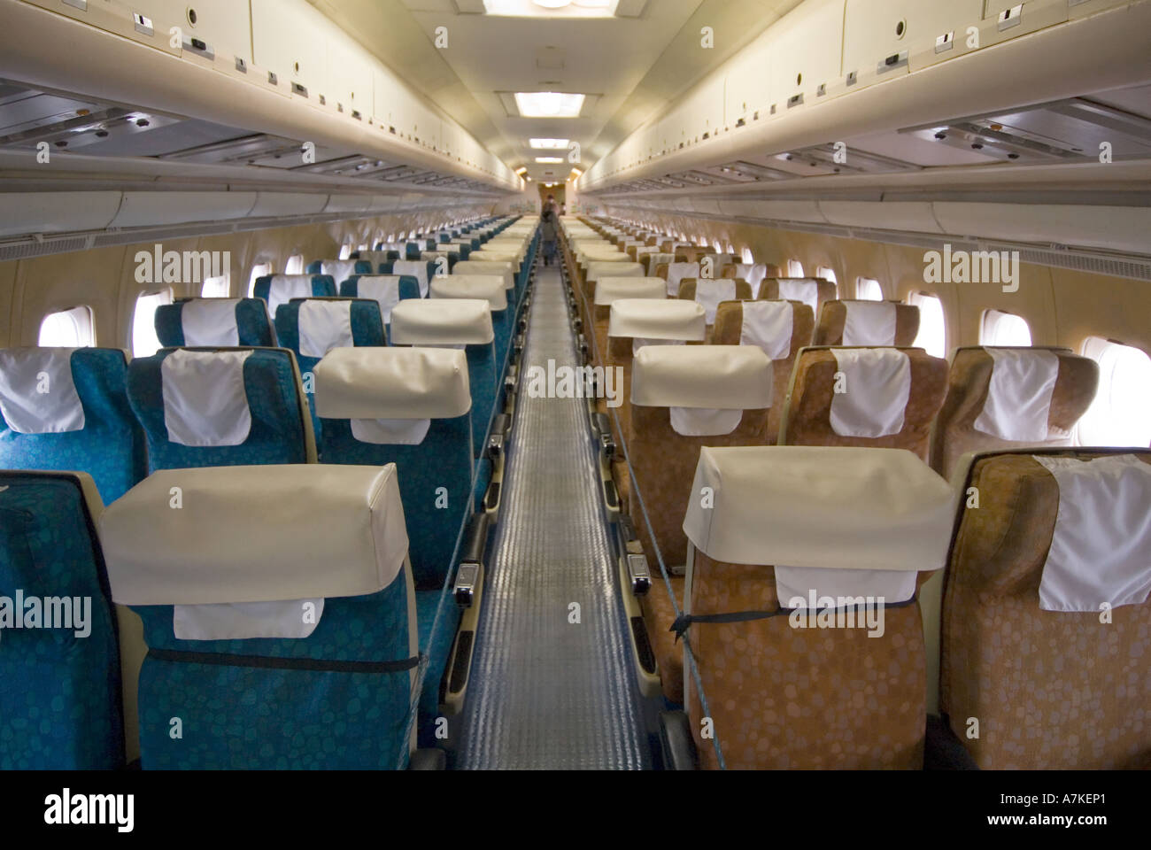 Duxford Imperial War Museum BOAC Cunard Super VC10 passenger jet airliner cabin interior being viewed by visitors Stock Photo