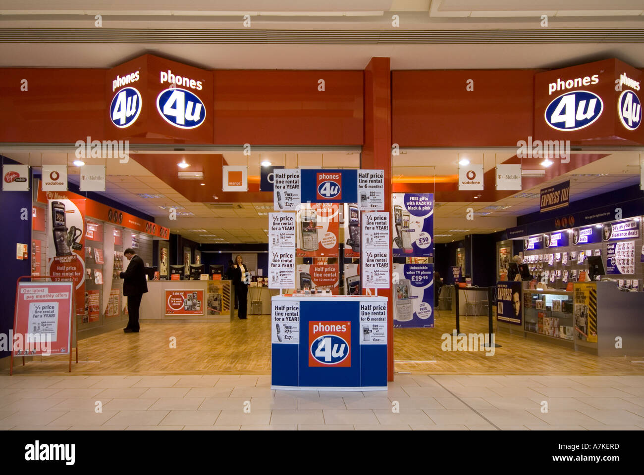 Mobile phone store open plan walk in shop front indoor shopping mall