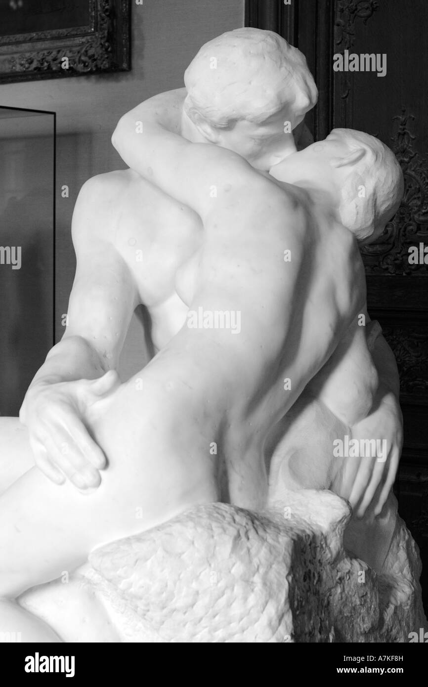 Photograph of the famous statue, The Kiss, by Rodin at the Rodin Museum in Paris, France. Stock Photo